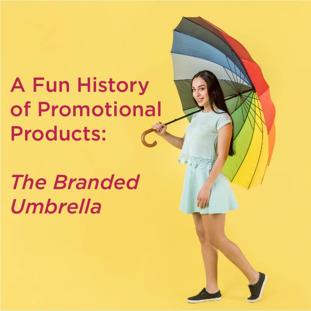 Woman holding rainbow colored umbrella
